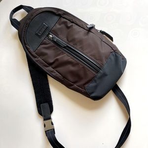 Coach one strap backpack, brown and black.